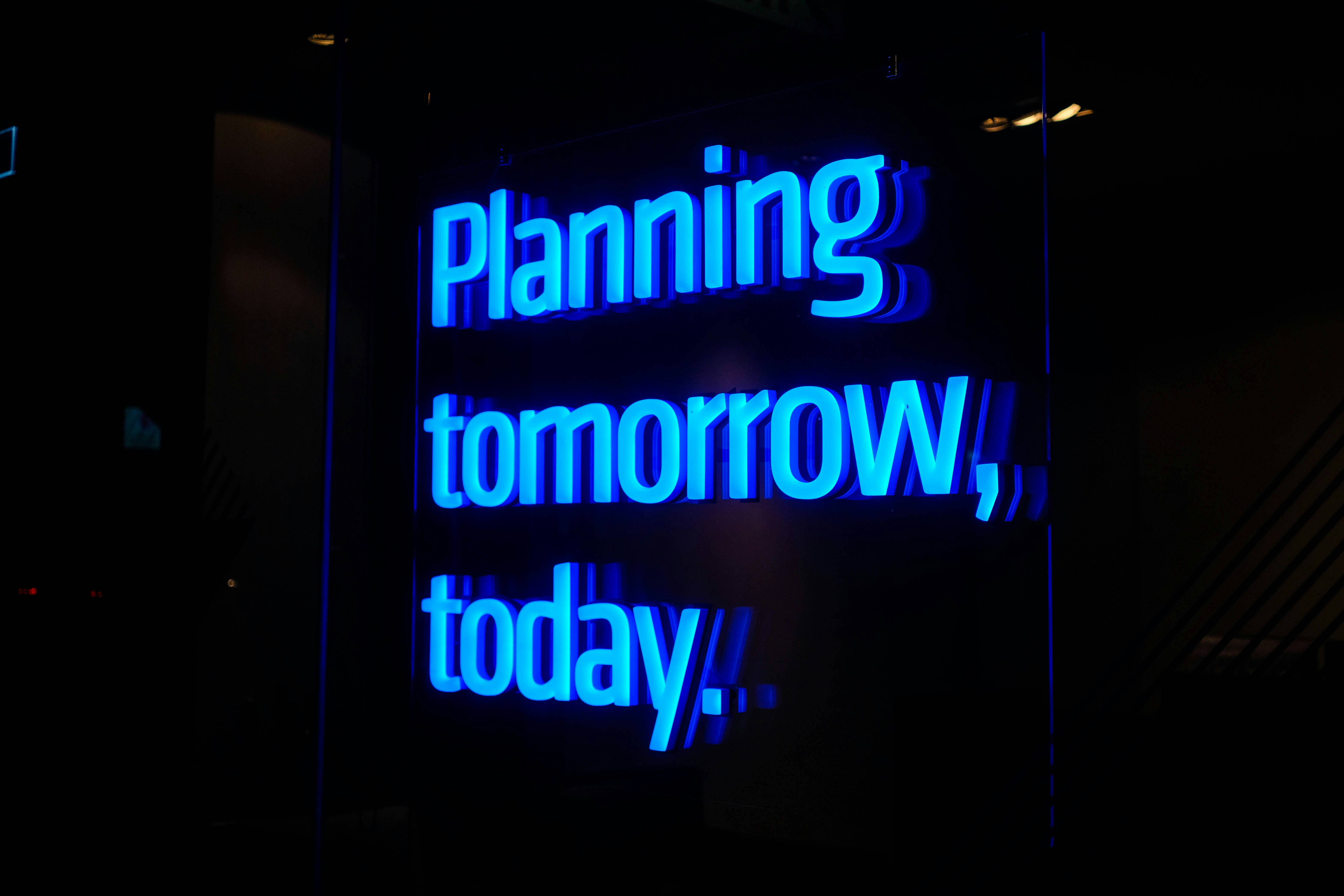 Planning tomorrow, today neon sign, Finchase Capital insights